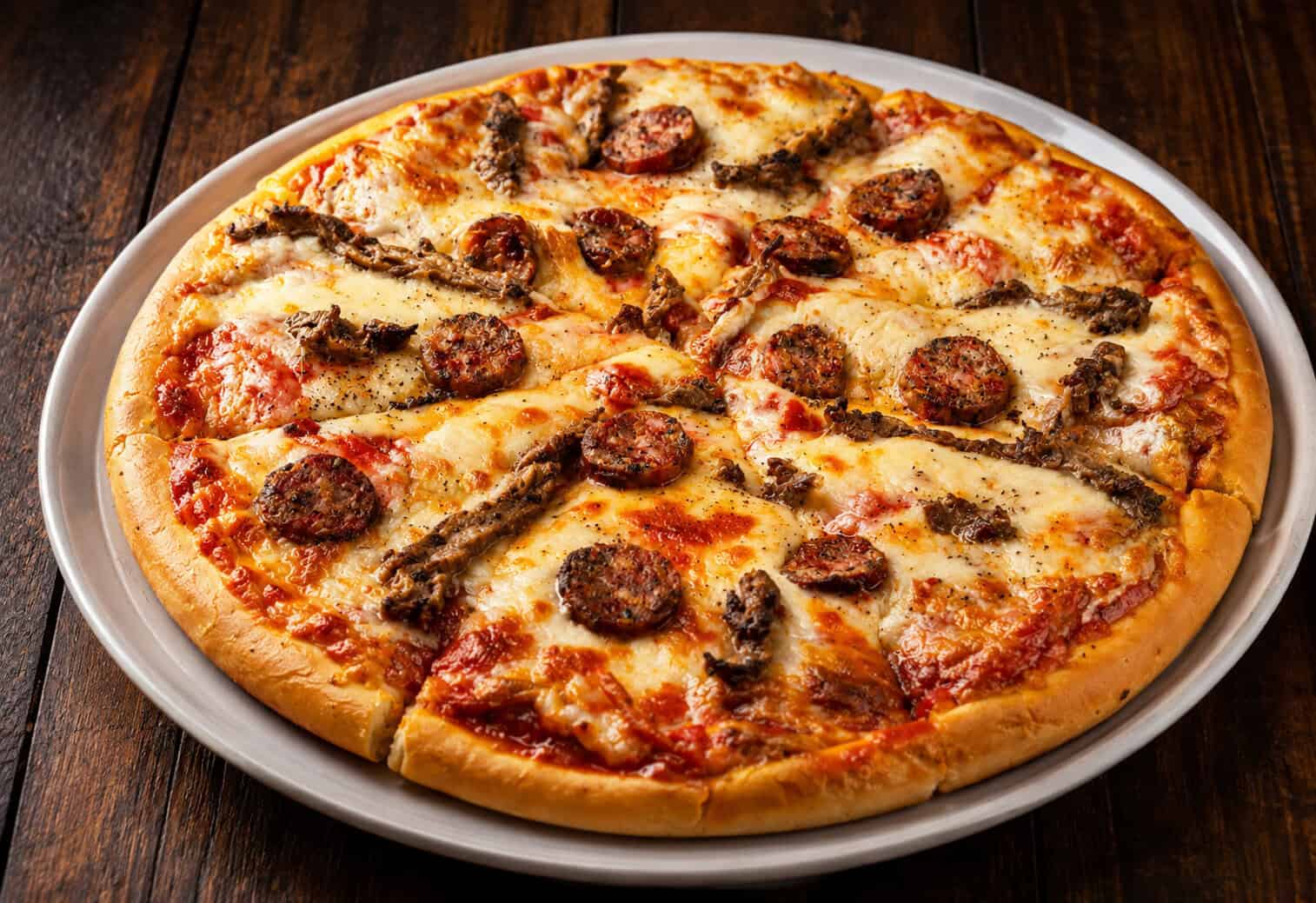 Pizza Tres Carnes
